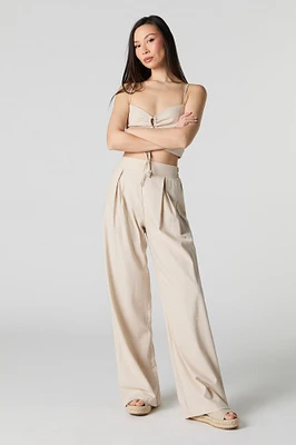 Pantalon à jambe large en mélange de lin plissé