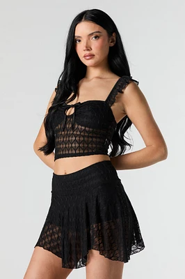 Minijupe-short asymétrique en dentelle
