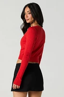 Cardigan écourté en tricot pointelle