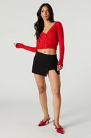 Cardigan écourté en tricot pointelle