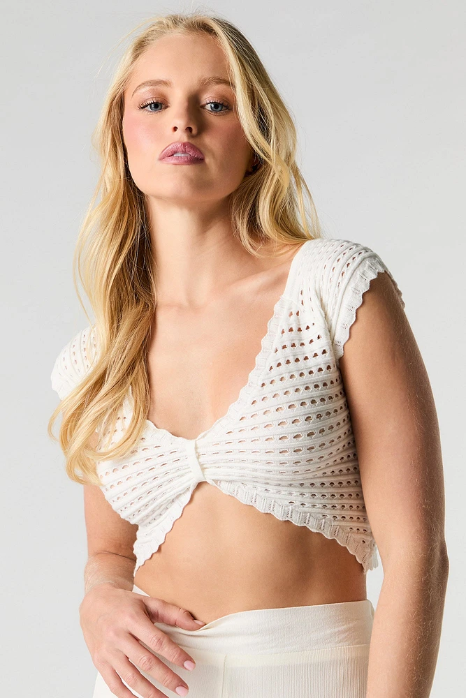 Haut écourté en tricot ouvert à col V