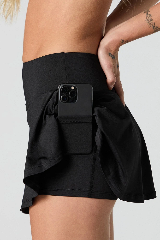 Jupe-short Active avec poche pour téléphone