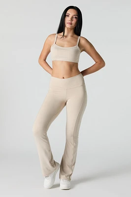 Legging évasé avec poche latérale Active