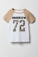 T-shirt à manches raglan avec imprimé City pour fille