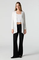 Cardigan ouvert en tricot semi-diaphane