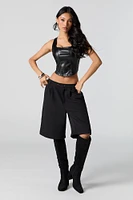 Camisole-corset en similicuir