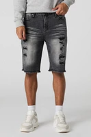 Short en denim d'aspect usé avec franges