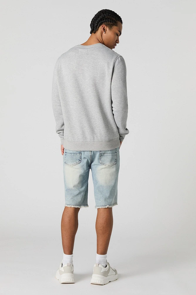 Short en denim d'aspect usé avec franges