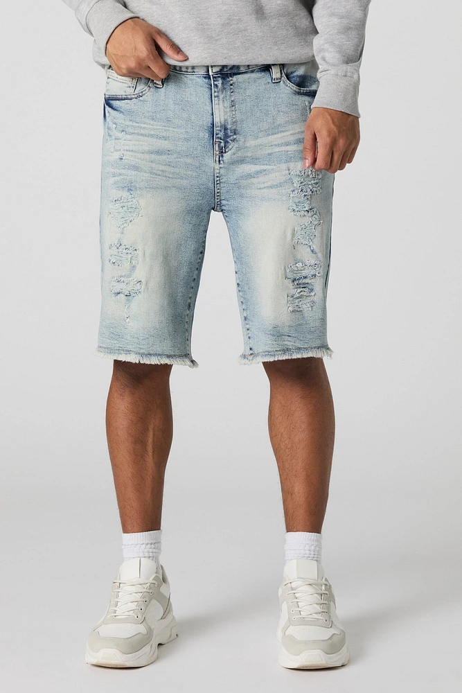 Short en denim d'aspect usé avec franges