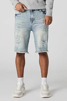 Short en denim d'aspect usé avec franges