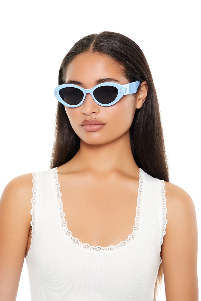 Lunettes de soleil ovales cloutées