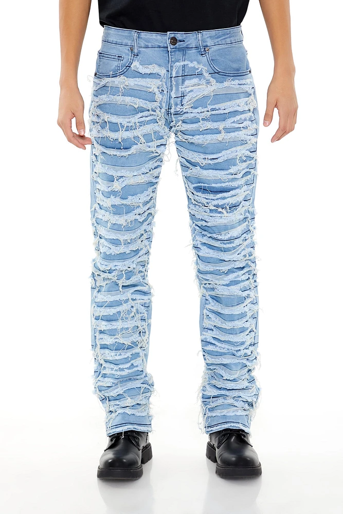 Distressed Slim Fit Mid Rise Jean