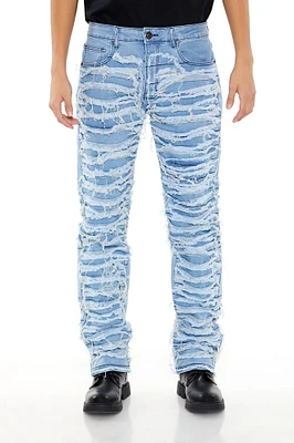 Distressed Slim Fit Mid Rise Jean