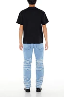 Distressed Slim Fit Mid Rise Jean