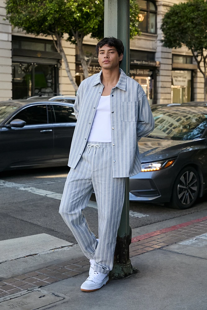 Pantalon coupe mince à rayures et taille coulissante