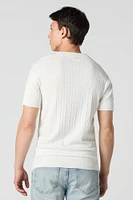 Haut en tricot torsadé avec col et encolure V