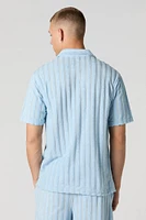 Haut boutonné en tissu bouclé ray