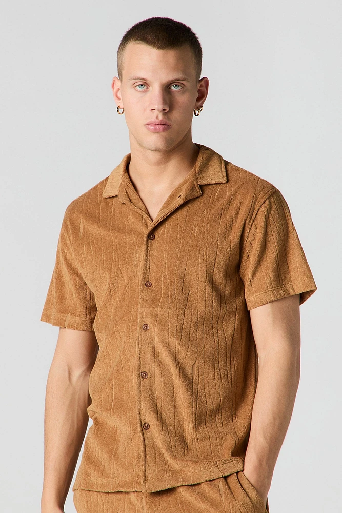Haut boutonné en tissu éponge textur