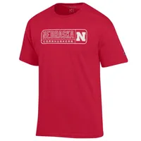 Huskers | Nebraska Champion Wordmark Logo Pill Tee Alumni Hall