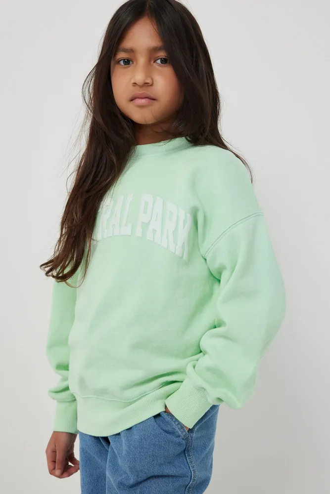 Ardene Kids Destination Crew Neck Sweatshirt in Light Green | Size Small | Polyester/Cotton | Fleece-Lined