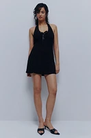 Ardene Eyelet Mini Halter Dress with Ribbon Bow in Black | Size | Polyester/Spandex