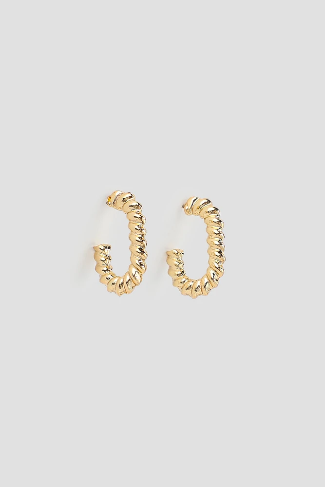 Ardene Twisted Hoop Earrings in Gold | Stainless Steel