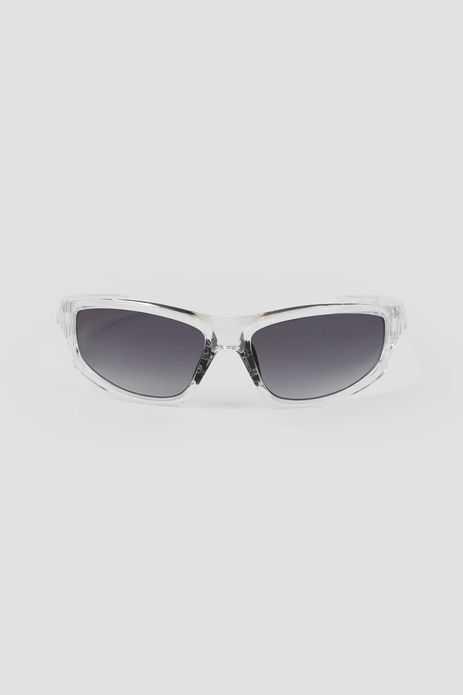 Ardene Wraparound Sporty Sunglasses in Clear