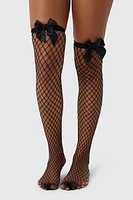 Ardene Fishnet Bow Stockings in Black | Elastane/Polyamide