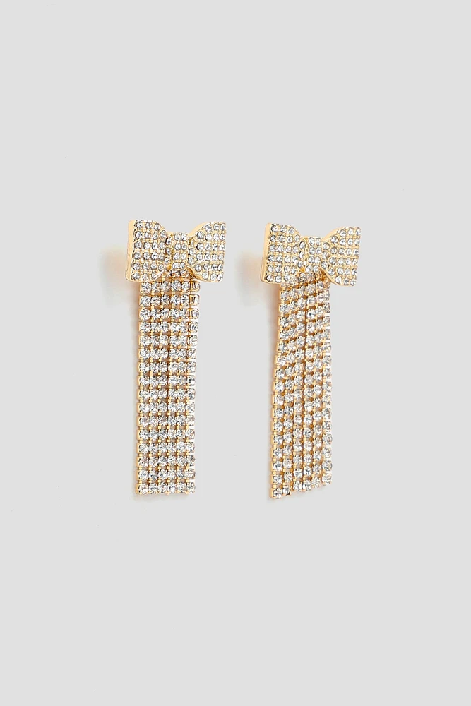 Ardene Rhinestone Bow Earrings in Gold | Stainless Steel