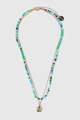 Ardene 2-Row Beaded Necklace with Flower Pendant in Green