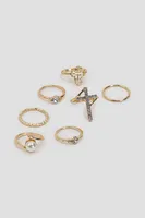 Ardene 7-Pack Pearl & Cross Rings in Gold | Size