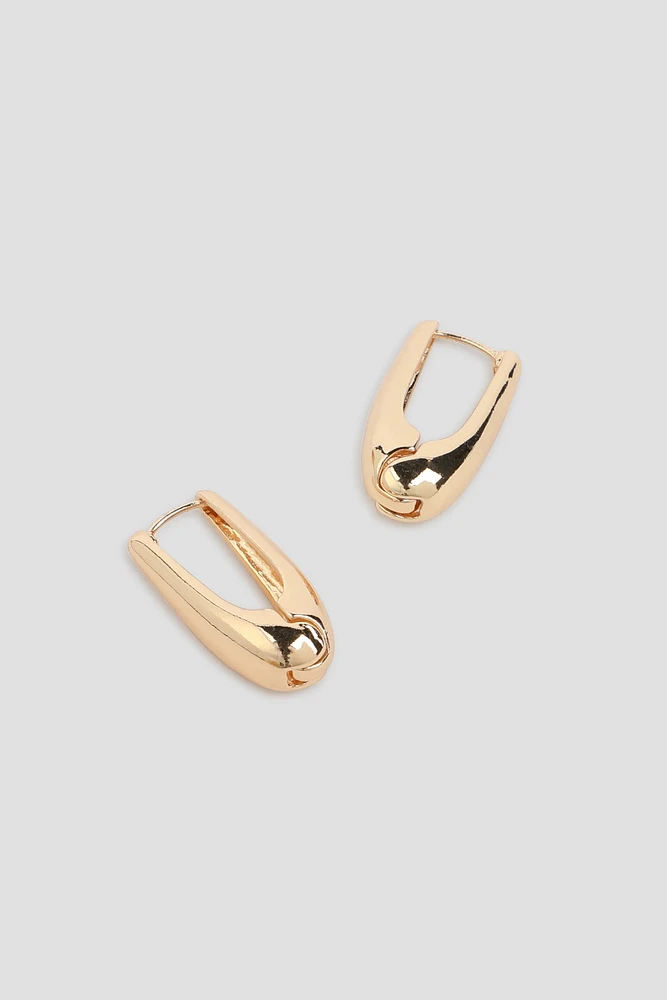 Ardene Thick Oval Hoop Earrings in Gold | Stainless Steel