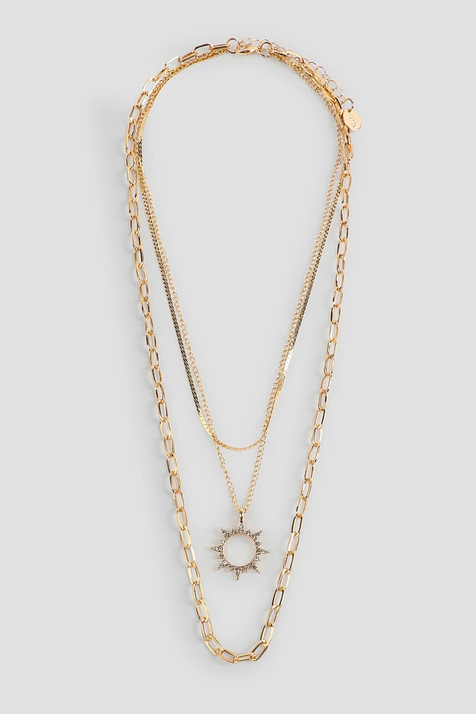 Ardene 3-Row Necklace with Sun Pendant in Gold