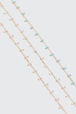 Ardene 3-Pack Colorful Stone Anklets in Gold