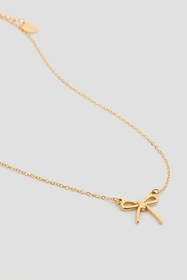 Ardene Stainless Steel Bow Necklace in Gold