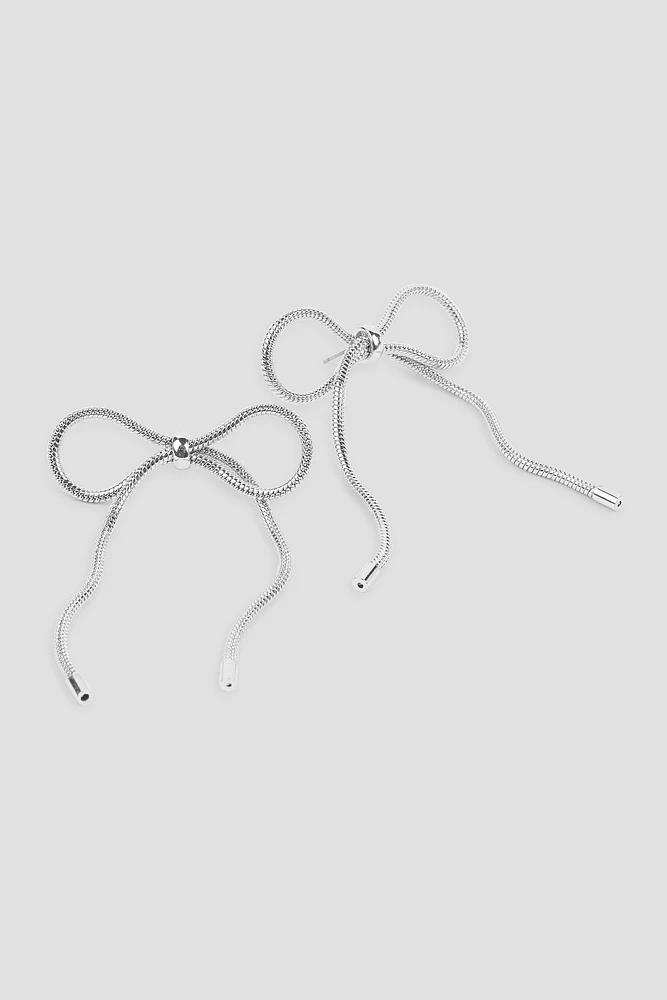 Ardene Chain Bow Earrings in Silver | Stainless Steel