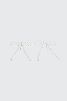 Ardene Pearl Bow Shape Earrings in White | Stainless Steel