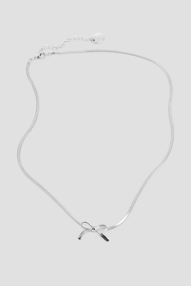 Ardene Flat Chain Necklace with Bow in Silver