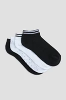 Ardene 4-Pack Solid & Striped Ankle Socks in Black | Polyester/Spandex