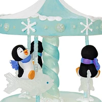 Playful Penguins on Carousel Musical Ornament With Light and Motion