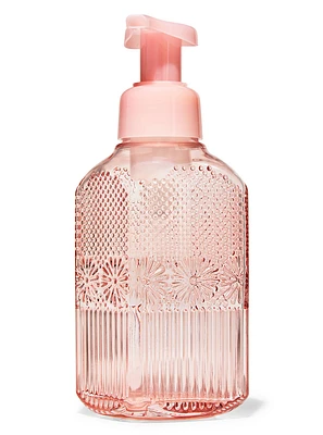 Distributeur de savon moussant pour les mains doux et net rose à motif floral