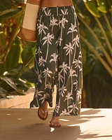 Pantalon jambe large à imprimé palmiers