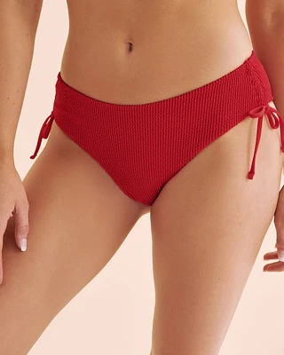 Bas de bikini taille basse texturé à smocks