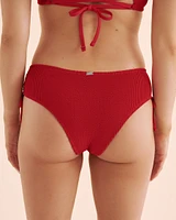 Bas de bikini taille basse texturé à smocks