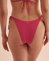 Bas de bikini tanga noué aux hanches