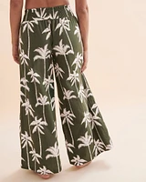 Pantalon jambe large à imprimé palmiers