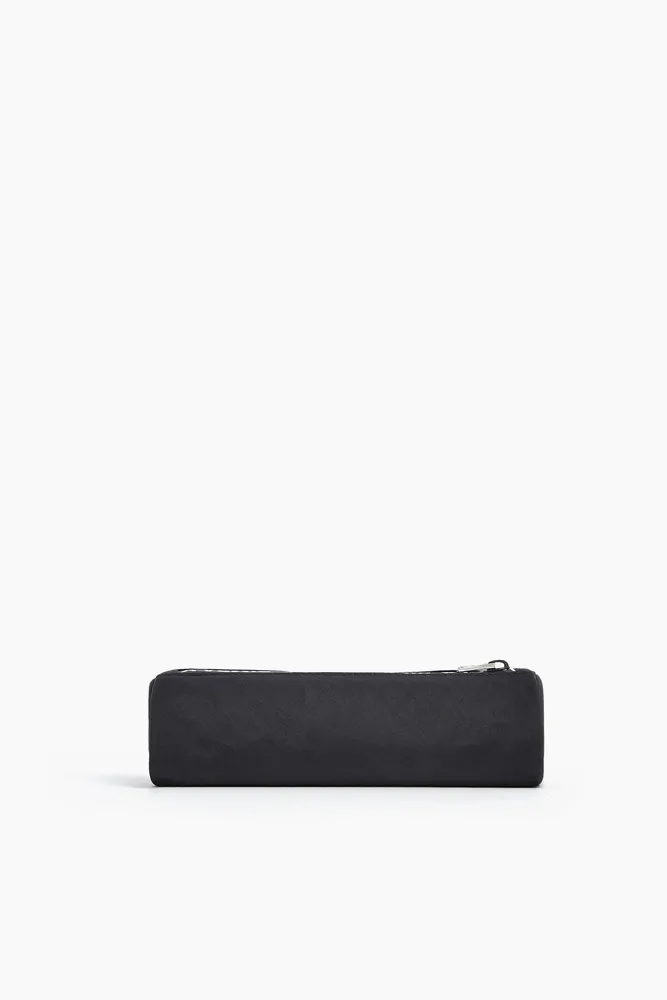 Estuche cilíndrico nylon negro