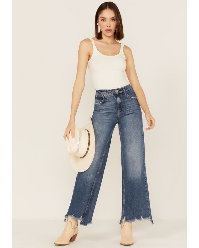 Mid Rise Medium Wash Ripped Baggy Tapered Jeans