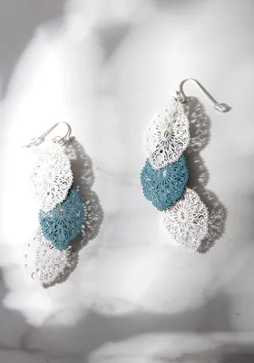 silver and blue long earrings