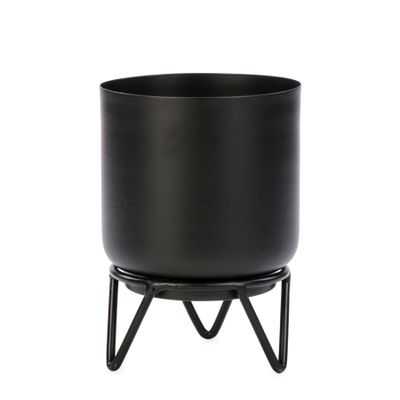 Black metal pot on base